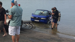 Watch This Heroic Rescue of a Sunken Amphibious Car<em></em><em></em>